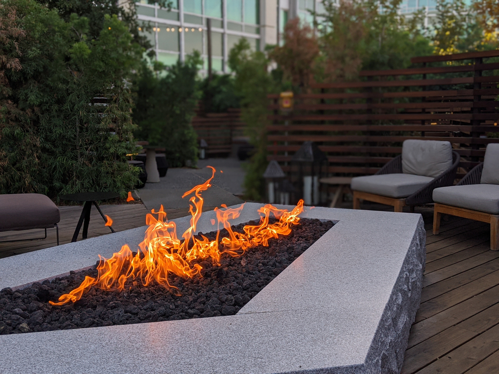 Embrace the warmth and magic of the blazing fire pit in Ames, IO